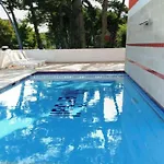 Enjoy Poolside Comfort-beahost Апартаменти